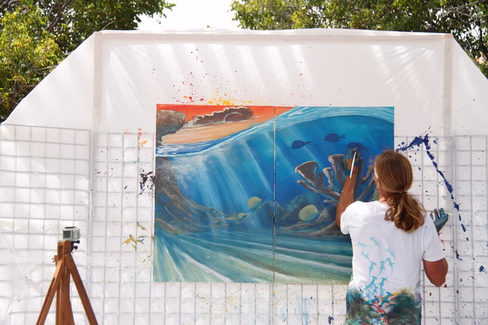 Carlos Hiller painting live in Curacao